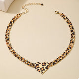 Leopard Heart Chain Necklace featuring a unique design with gold-plated links and a leopard print heart charm.