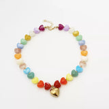 Colorful Heart Pendant Beaded Collarbone Necklace featuring vibrant heart-shaped beads and a gold pendant.