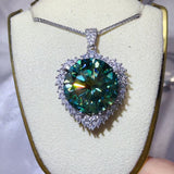 20 Carat Moissanite 925 Sterling Silver Pendant Necklace displayed on a jewelry stand.
