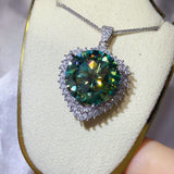 20 Carat Moissanite 925 Sterling Silver Pendant Necklace displayed in a matching box.