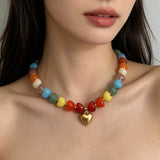 Colorful Heart Pendant Beaded Collarbone Necklace with multi-colored beads and 18K gold-plated heart charm, perfect bijoux for femme.