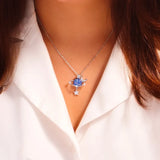 Starry Sky Inlaid Zircon Moon Star Necklace showcased on a model, highlighting its unique design and sparkle.