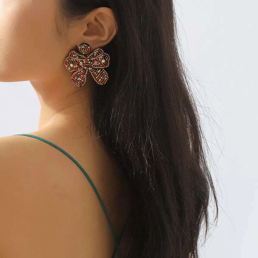 Boucles d'Oreilles Nœud de Noël Perlées