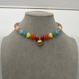 Colorful Heart Pendant Beaded Collarbone Necklace displayed on a bust, showcasing vibrant heart-shaped beads.